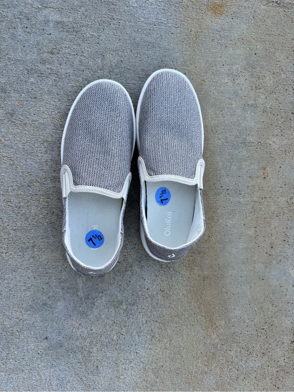OluKai Women’s Slip-On Sneakers in Light Gray and White